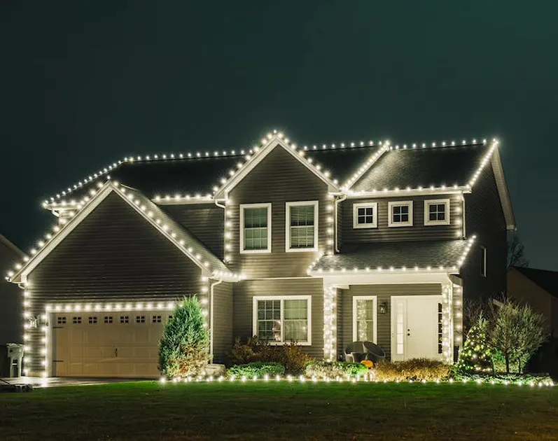 Home illuminated with professionally installed Christmas lights